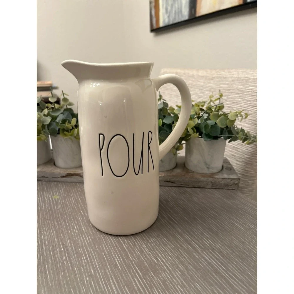 Rae Dunn ceramic pitcher featuring the‎ word 